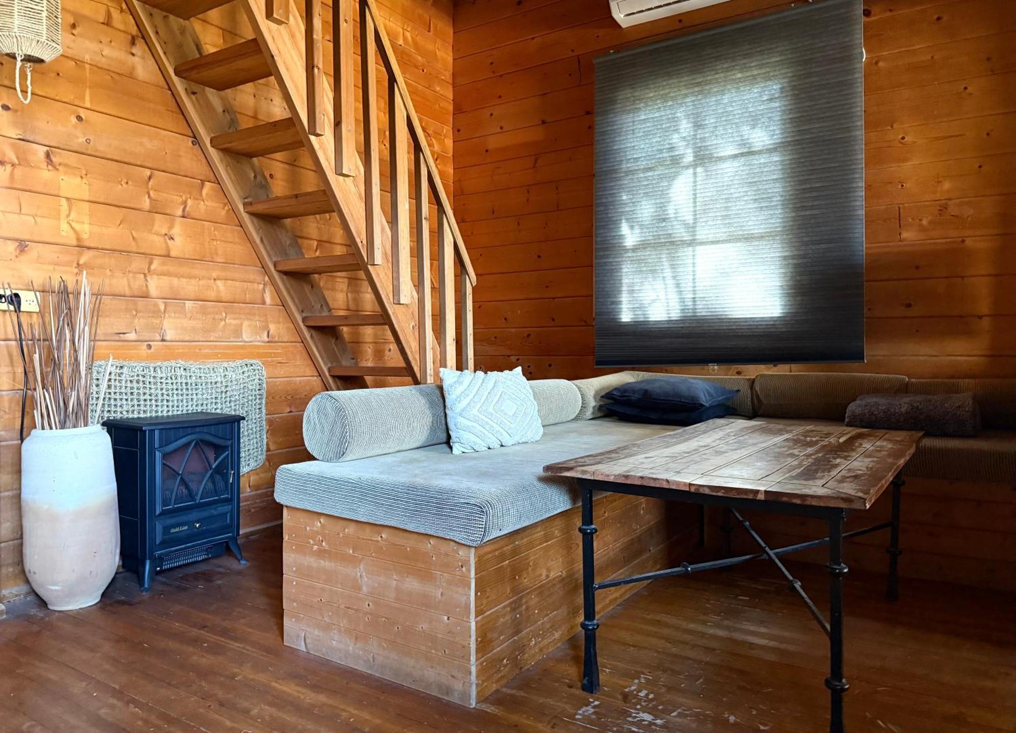 Wooden Edge Of The Village Lodge