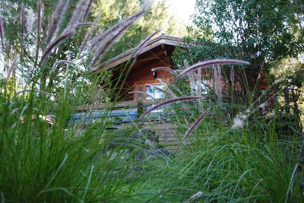 Wooden Edge Of The Village Lodge